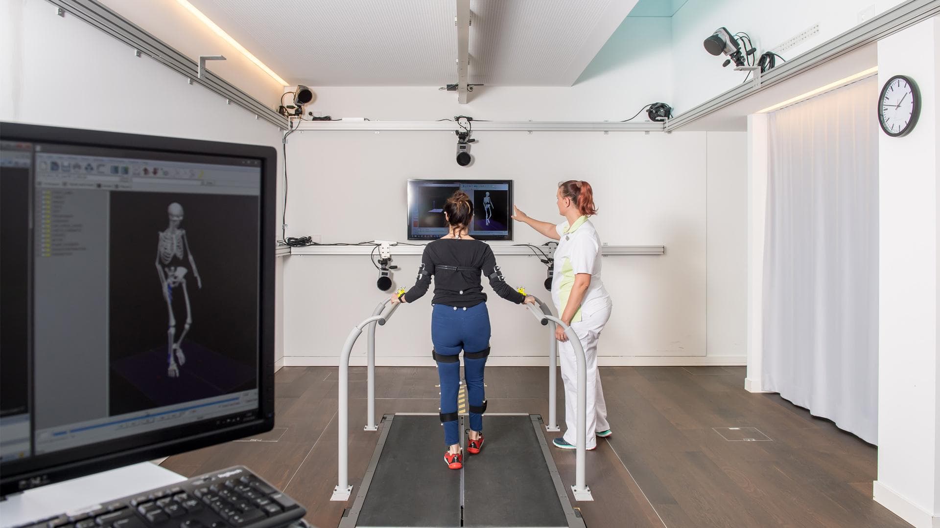 Mayuri Gad conducting a clinical biomechanics assessment in a 3D gait lab